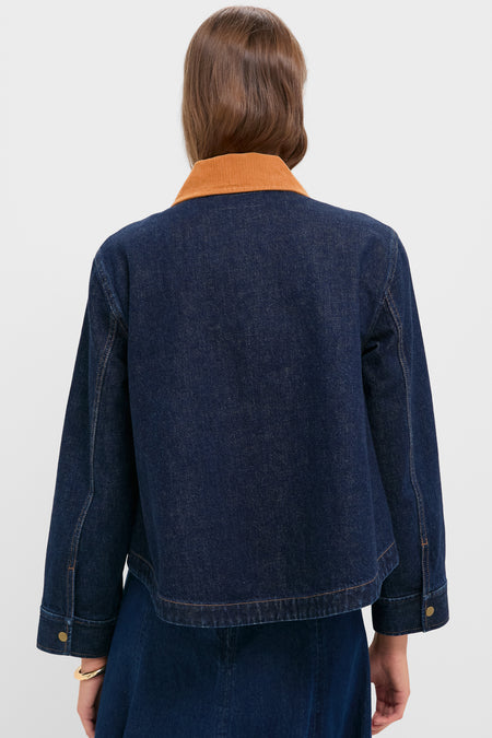 Classic Midnight Rinse Denim Swingy Jacket with rust-orange corduroy collar, snap-and-zip closures, and pleated pockets. Effortlessly high-end and fun for versatile, stylish layering.