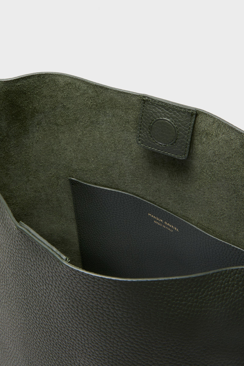 Interior view of the Seaweed Everyday Cabas, showcasing its classic suede-lined interior, effortless slip pocket, and high-end magnetic closure, reflecting Tuckernuck's fun, luxurious style.