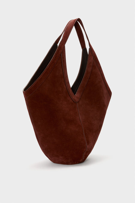 Classic Chocolate Soft M Hobo handbag in deep brown suede, featuring a slouchy design with V-shaped opening and medium straps, exuding effortless, high-end style.