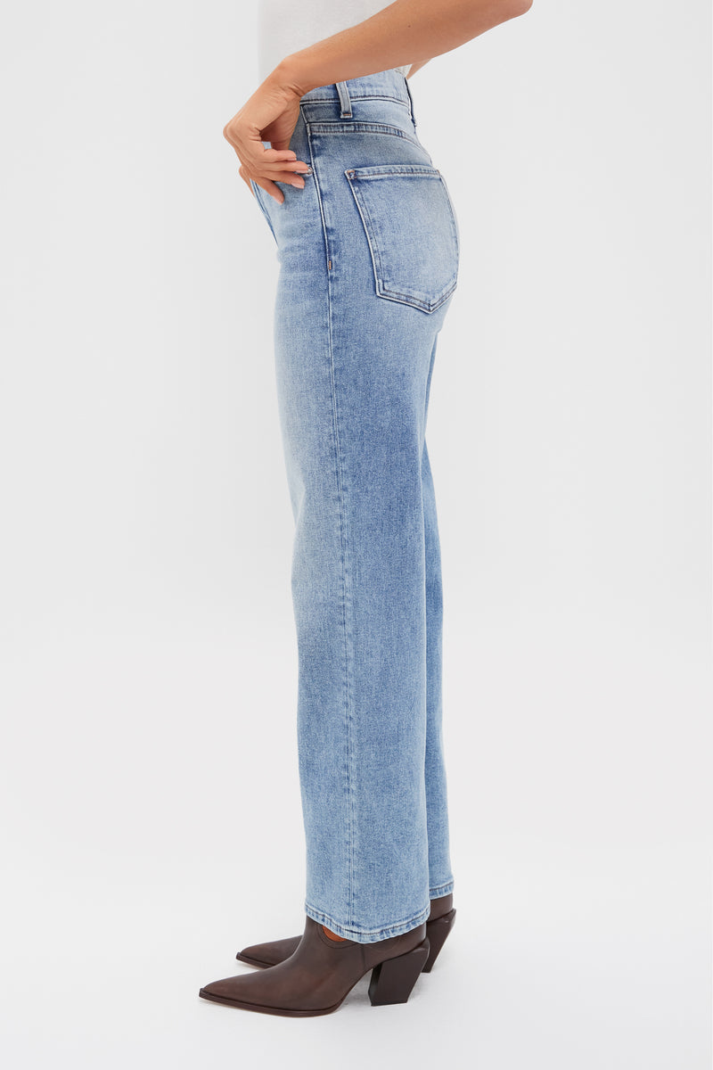 Classic side-profile of the Big Chill 90's Mid Rise Straight Ankle jeans, effortlessly styled with dark brown boots, showcasing a high-end, fun, and vintage-inspired look.