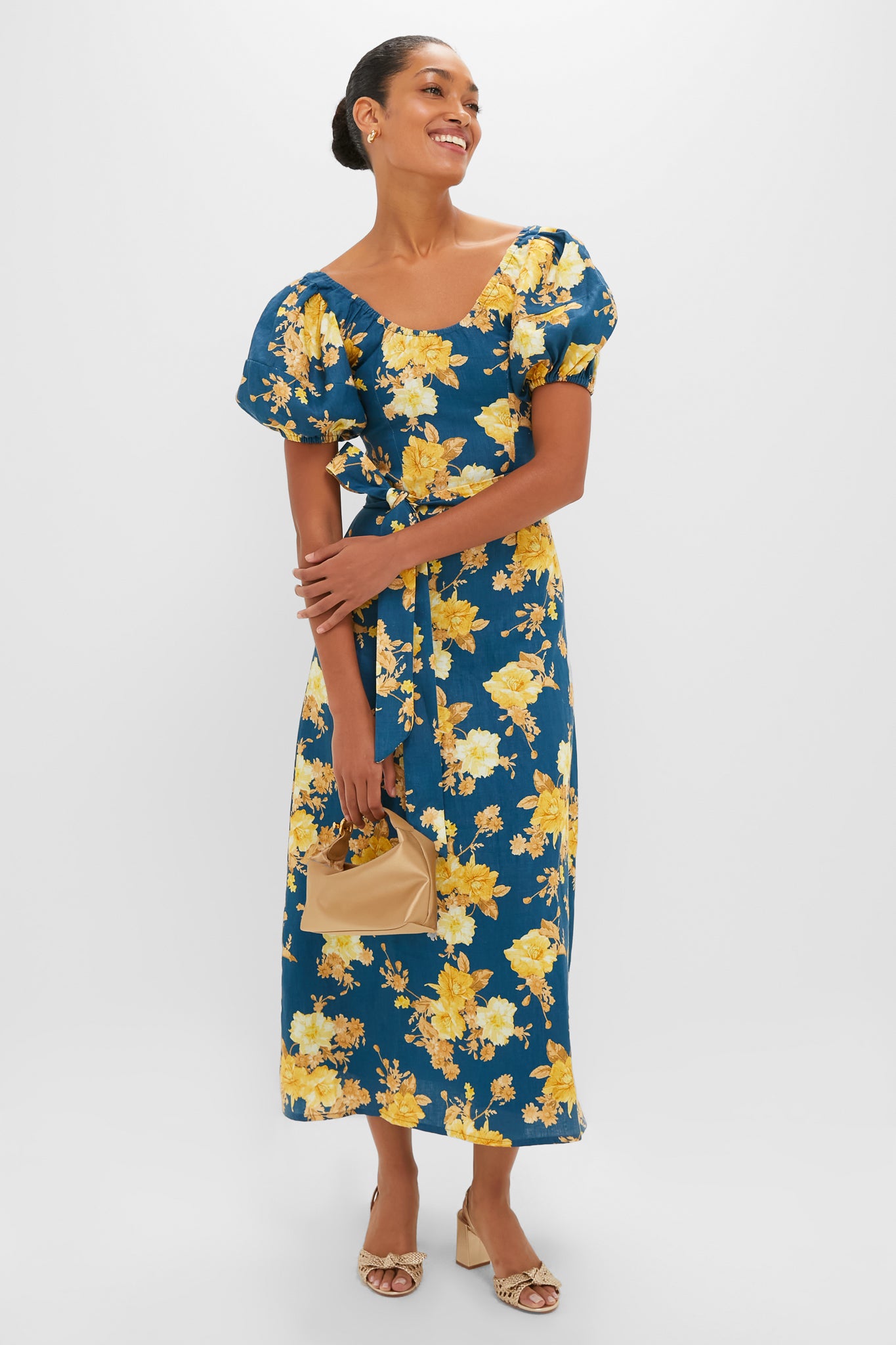 Nora Floral Navy Leiria Midi Dress: A classic, effortless, and fun high-end piece with puff sleeves, scoop neckline, and self-tie belt, perfect for any occasion.