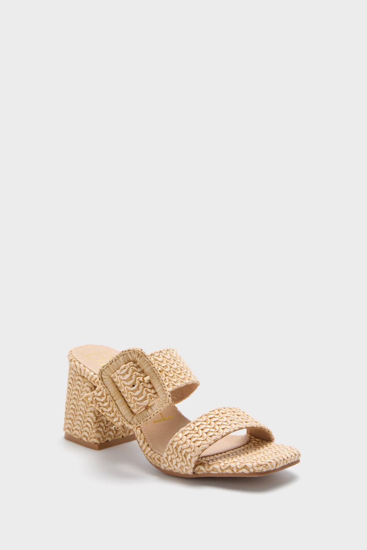 The Matisse beige woven sandal features a chunky raffia block heel, two wide straps, and a large decorative buckle on the front—stylish slip-ons inspired by Natural Lucy Heels.