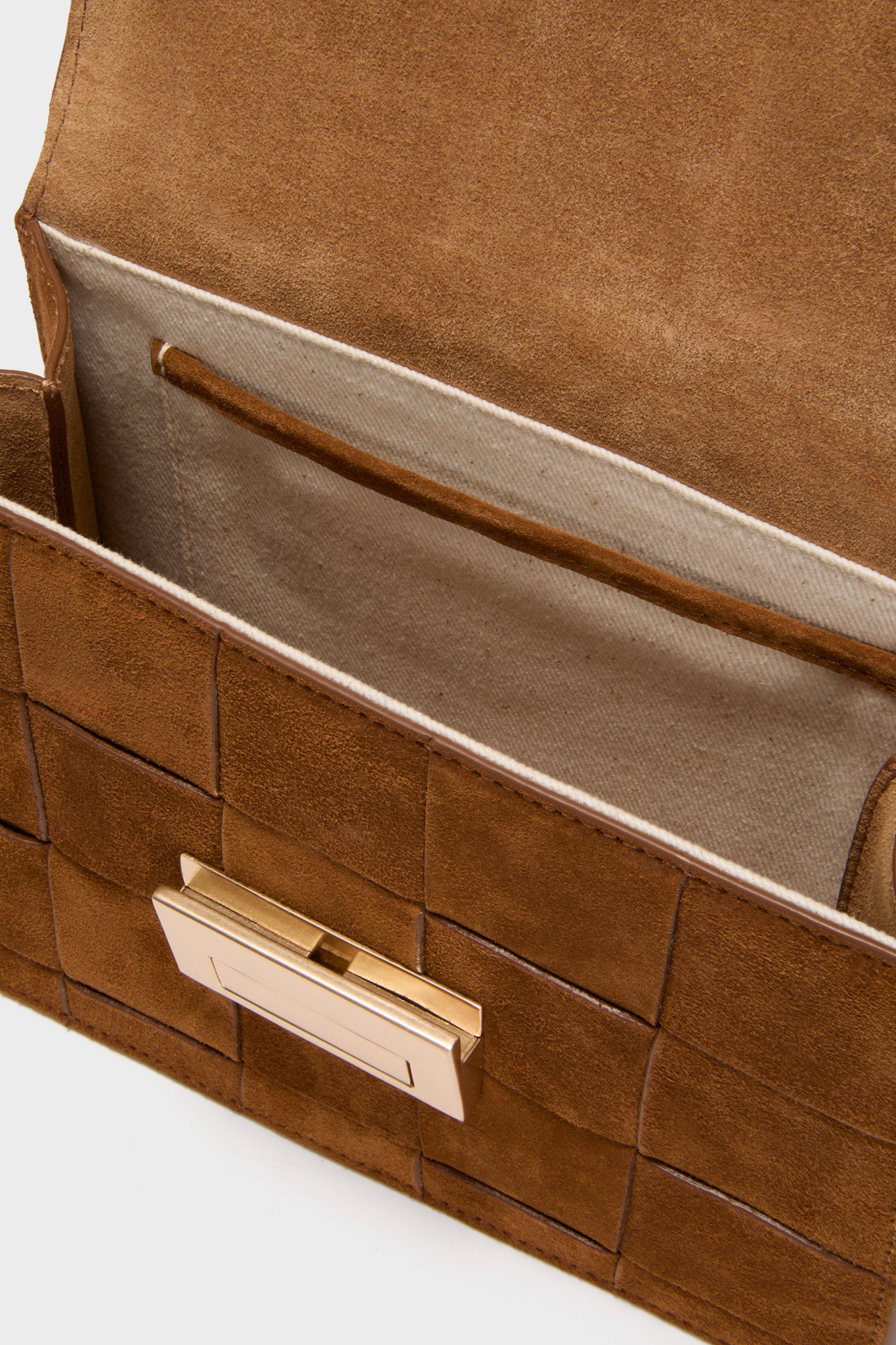 Woven Cacao Suede Delphine Crossbody Bag, showcasing a classic, high-end design with woven suede panels and gold-tone clasp, open to reveal an effortless, fun interior.