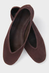 Seal Brown Courtney Flats in brown suede, featuring a classic slip-on design with a softly pointed toe and low-cut topline, exude effortless, high-end style.