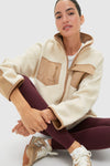 Buttercream Fleece Lawrence Full Length Zip Up: A classic, effortless sherpa jacket with fun contrast trim and pockets; perfect for high-end athleisure looks.