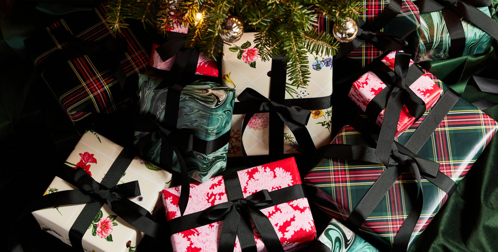 Wrapped presents under a tree. 