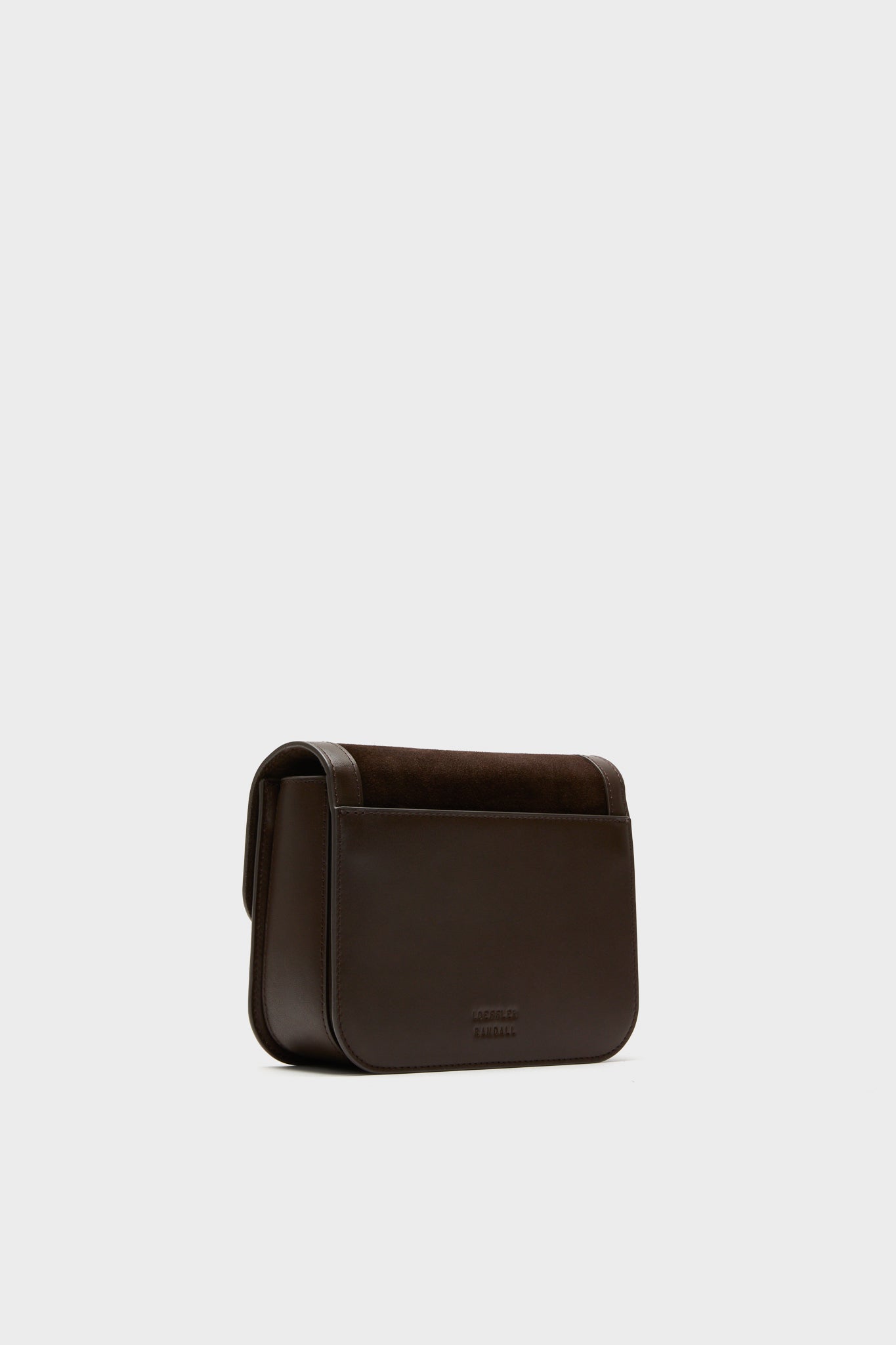 Tmoro Suede Desi Crossbody Bag: A classic, high-end leather crossbody with flap top and gold hardware. Effortless style for fun, everyday use.