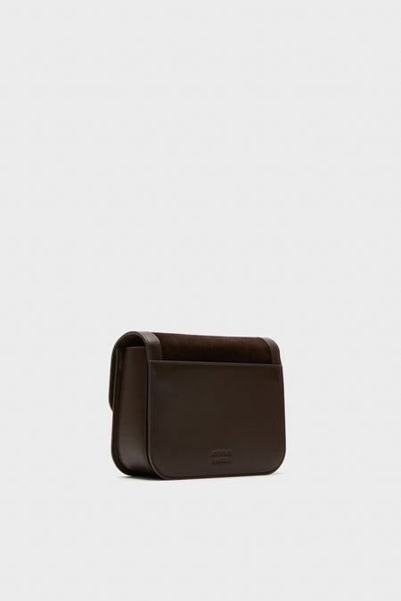 Tmoro Suede Desi Crossbody Bag: A classic, high-end leather crossbody with flap top and gold hardware. Effortless style for fun, everyday use.