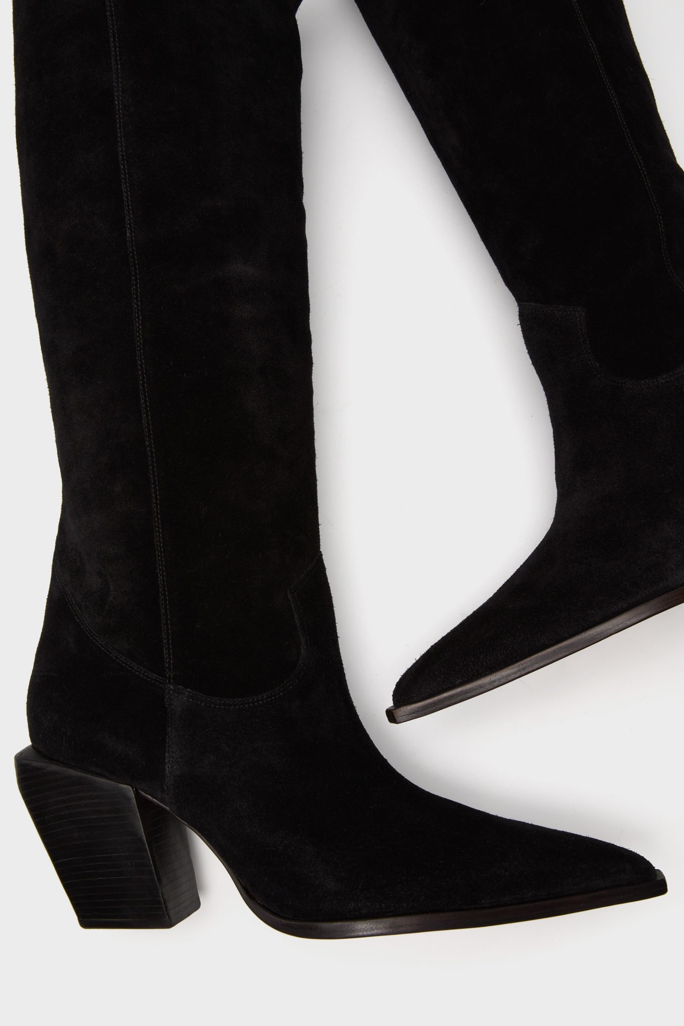 Black Suede Maine Up Boots: classic mid-calf cowboy style with pointed toes and angled block heels for an effortless, high-end look that's fun and statement-making.