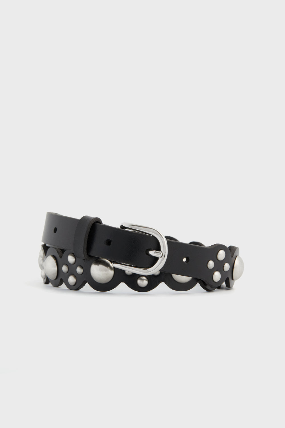 The Isabel Marant black calfskin leather belt features scalloped edges, silver studs, and a silver buckle—an iconic accessory from the brand.