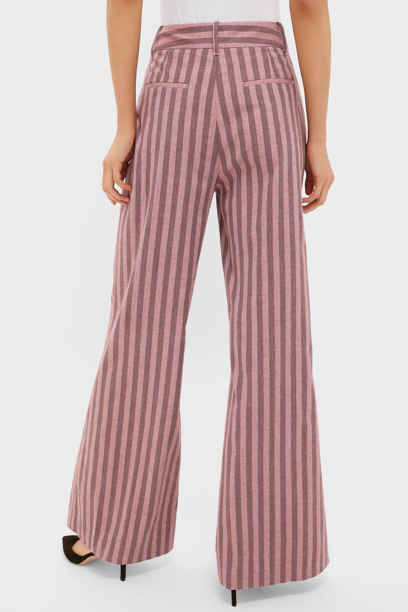 Back view of the Mauve Stripe Wyatt Pants, showcasing classic, effortless style with high-waisted, wide-leg fit and fun pink stripes. Perfectly paired with heels for a high-end look.