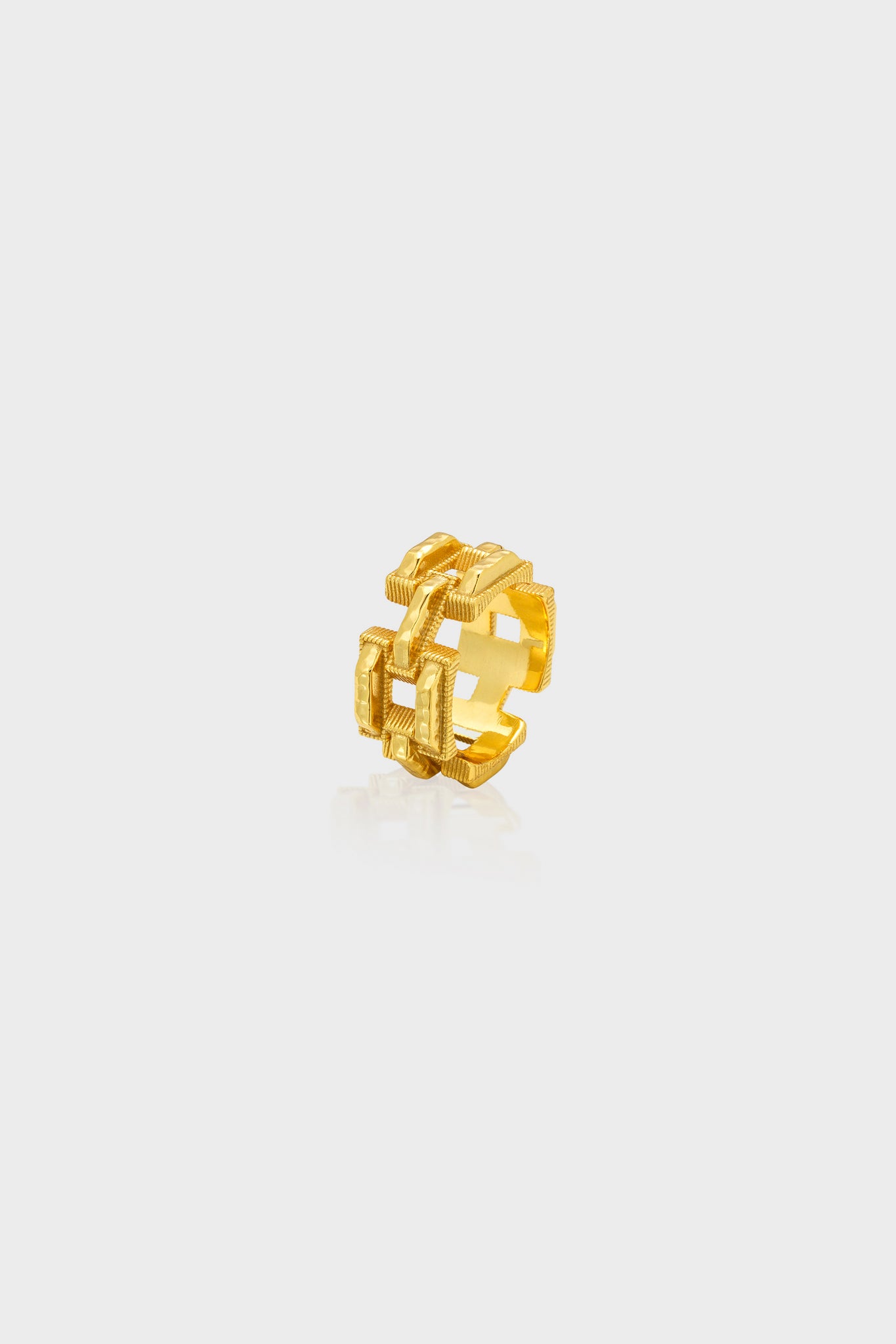 Pathway Ring in Gold: A classic, high-end geometric open-work design featuring interlocking rectangles. Effortless style for any occasion, adding a fun modern touch.