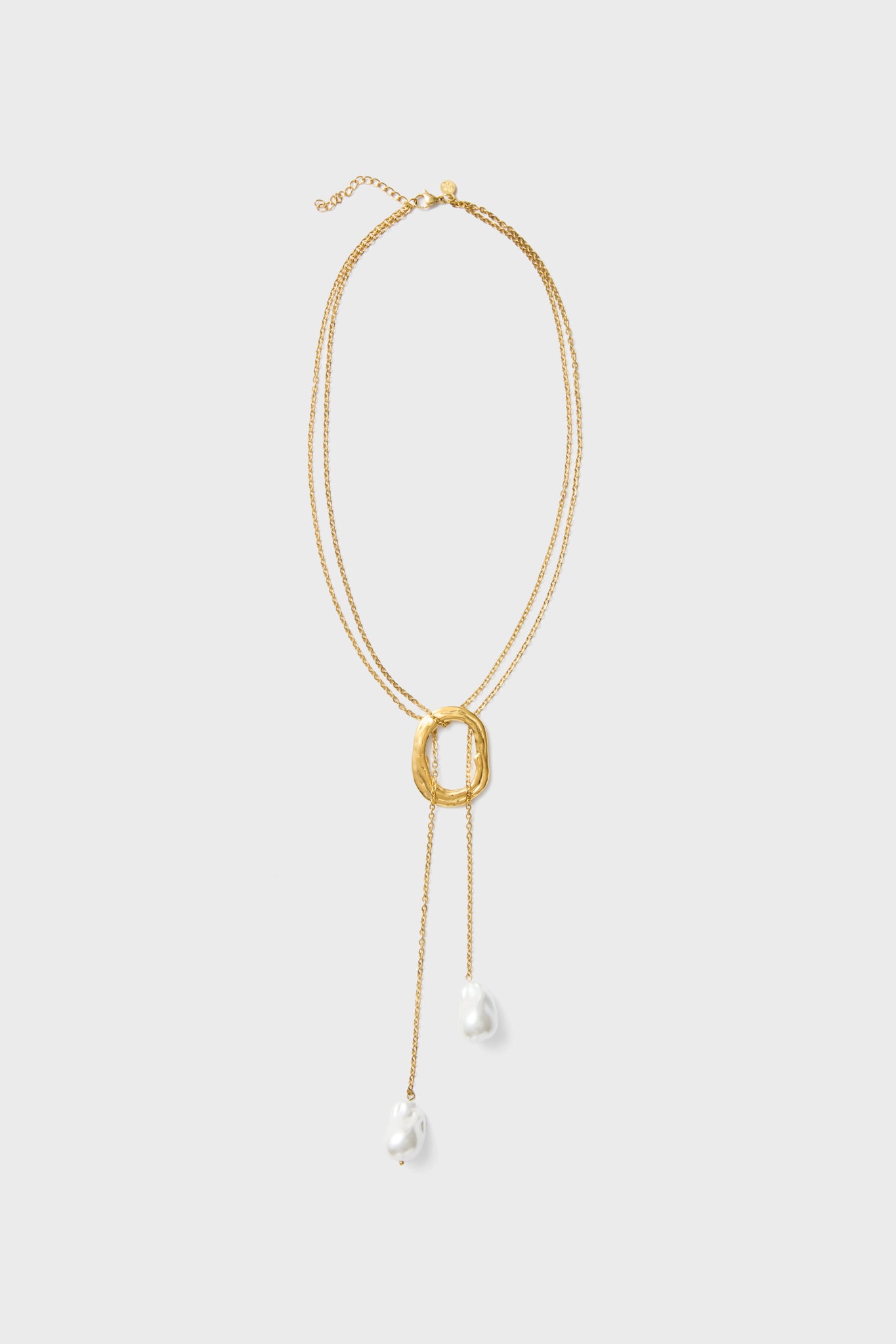 Petit Moments Gold Solar Necklace features a double strand design with a statement pendant and two dangling white pearl-like beads, perfect for elevating any look.