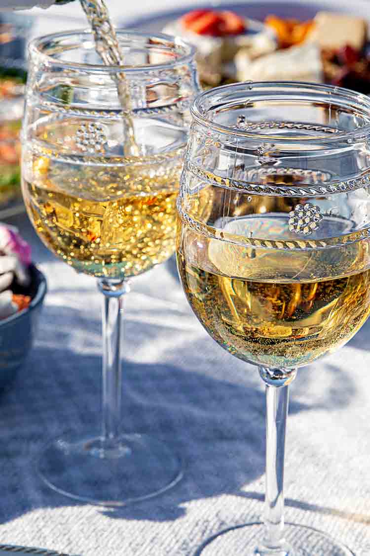 Isabella Acrylic Wine Glass Set of 4 features classic, ornate stemmed glasses with beaded detailing, perfect for an effortless and fun outdoor gathering.