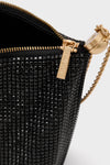 Cult Gaia Black Rue Wristlet, adorned with black beads and gold detailing, exudes classic elegance and effortless glamour, perfect for high-end evening events.