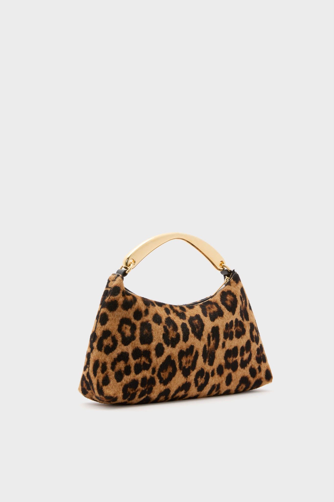 Leopard Metal Handle Rhea Bag: A classic, high-end structured handbag featuring an effortless leopard-print faux-fur design with a fun, sleek gold metal top handle for chic outings.
