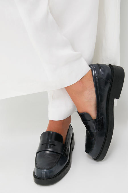 Black Dylan Loafers showcase a classic, effortless style with a rounded toe and chunky sole, perfect for a fun, high-end look with any outfit.