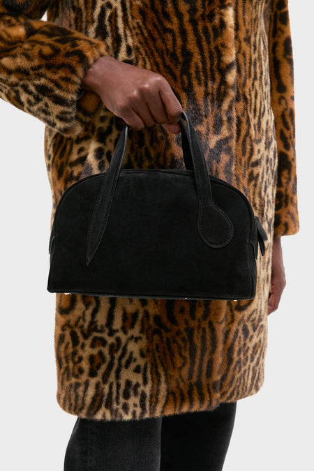 Classic Black Suede Mini Bowling Bag with sprout handles and gold-tone hardware, exuding effortless style. Perfect for fun, high-end street style with a detachable strap.