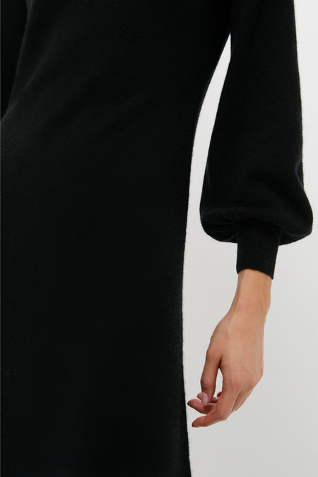 Black Cashmere Turtleneck Maxi Dress with classic blouson sleeves and ribbed cuffs, exuding an effortless, high-end style perfect for any fun, confident outing.