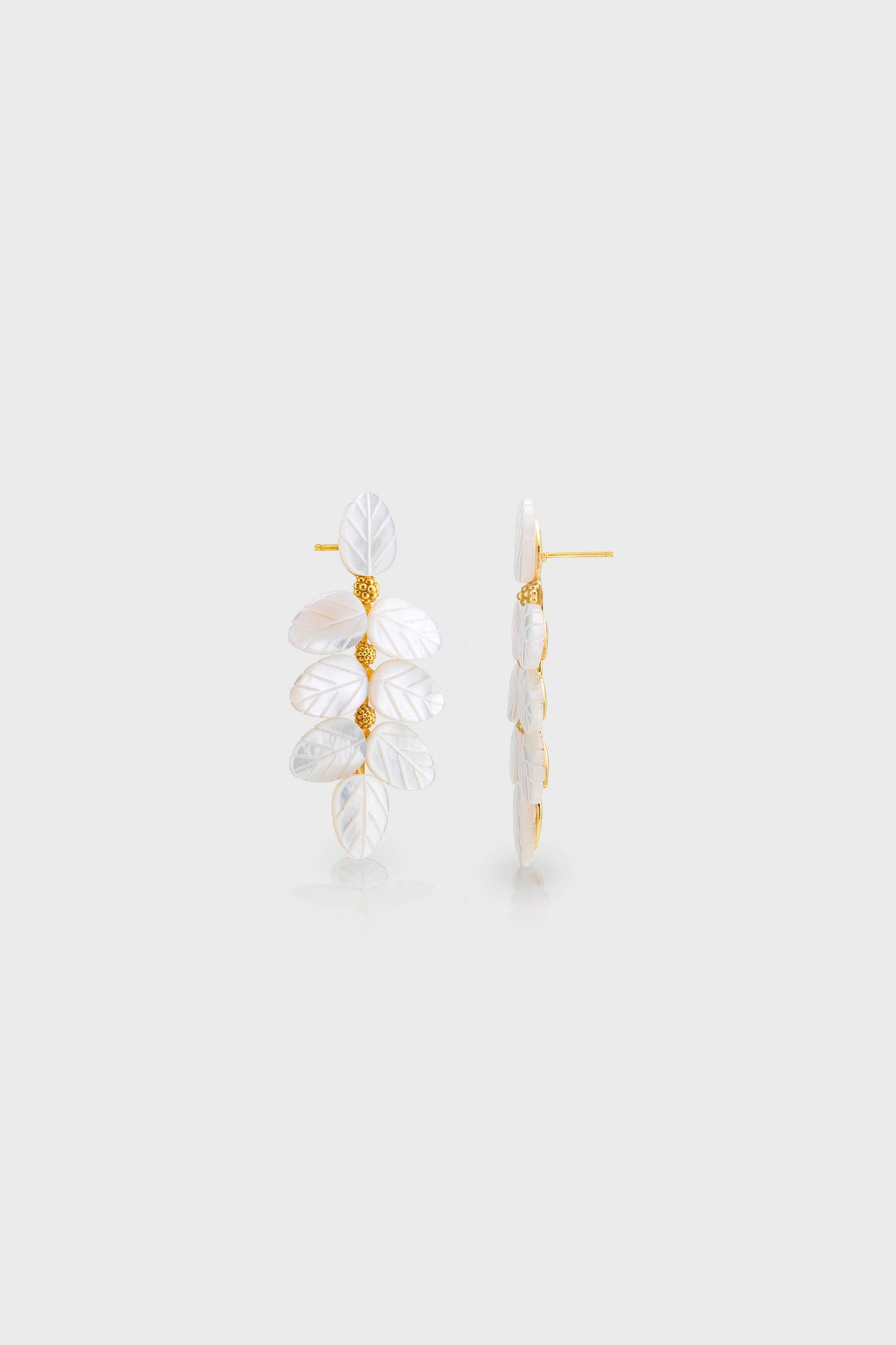 Mermaid Garden Vine Drop Earrings - MOP feature classic, hand-carved mother-of-pearl leaves and textured gold beads, creating an effortless, high-end, and fun accessory.