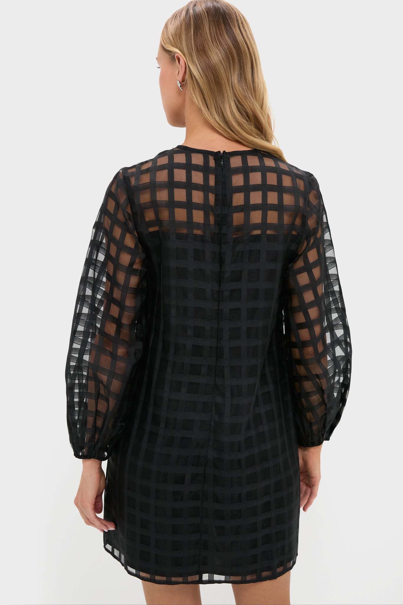 Effortlessly chic, the Organza Windowpane Janie Mini Dress features a classic silhouette with long puff sleeves and a high-end windowpane pattern for a fun, confident look.