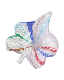 A Tuckernuck Vintage Accessories glass dish shaped like a leaf, featuring swirled patterns in white, red, green, blue, and purple with textured details.
