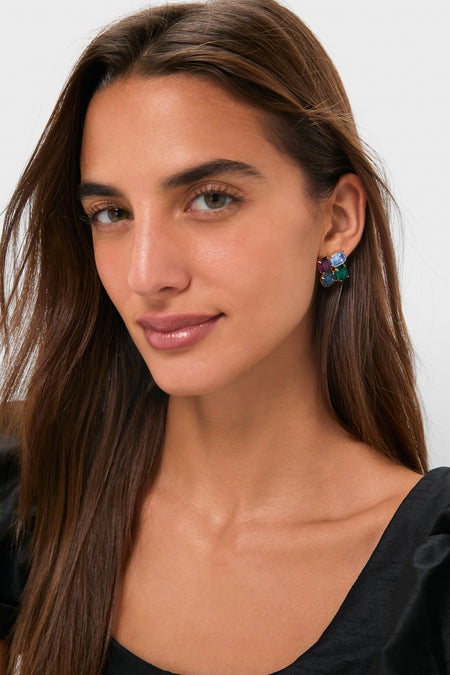 Young woman models classic Multi Piccolo Earring, featuring a fun mosaic of jewel-toned, emerald-cut stones set in high-end, effortless gold-plated brass.