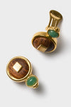 Classic and effortless Oak and Green Earrings featuring gold-tone frames, domed wooden discs, and green stones, offering a fun, high-end touch to any outfit.