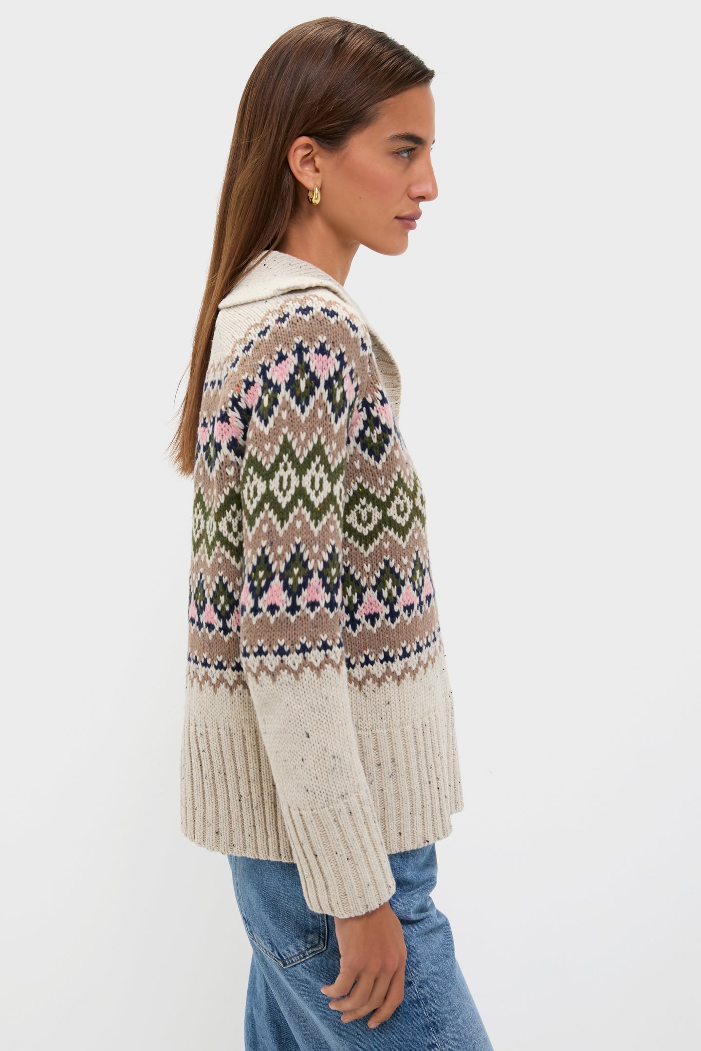 Eggshell Fair Isle Edna Sweater, classic and relaxed, features geometric motifs, spread collar, and ribbed finishes, worn effortlessly with jeans for a high-end, fun look.