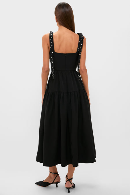 Black Embellished Agnes Maxi Dress: Classic, high-end evening glamour with effortless studded bow straps, corset waist, and flowing skirt. Perfect for fun, special occasions.
