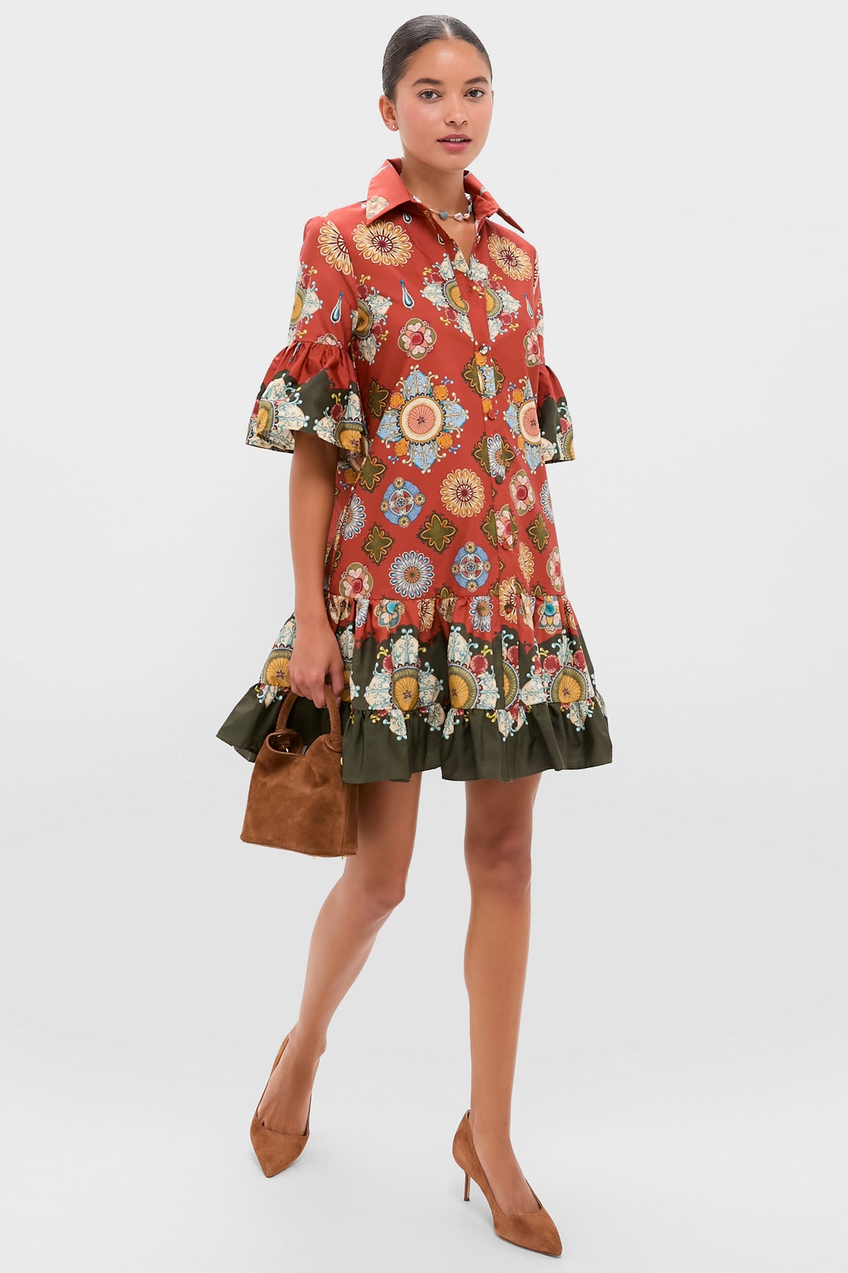 A woman in a vibrant red dress from La DoubleJ.