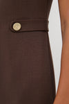 Chocolate Brown Zarah Midi Dress close-up, showcasing textured fabric, self-fabric belt tab with a gold-tone button, and classic silhouette for an effortless, fun, high-end style.