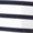 Close-up of a surface featuring alternating horizontal black and white stripes in a bold, graphic pattern.