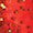 Close-up of a juicy red strawberry surface featuring seeds and vibrant textured skin.
