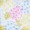 A faint pastel-colored abstract pattern with pink, blue, and yellow hues blending together; overlapping circular shapes create a soft, textured design.