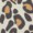 Close-up of a leopard print pattern featuring irregular black and brown spots, capturing the wild elegance of animal-inspired design.