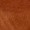 Close-up view of a brown textured surface, possibly suede or leather material, highlighting its rich, tactile texture.