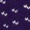 A deep purple surface features small, light-colored abstract shapes evenly spaced across it.