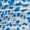 Abstract pattern of blue, white, and black shapes resembling camouflage or a mosaic, with irregular blobs and patches creating a dynamic visual effect across the image.