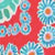 A pattern of blue and white flowers with orange centers on a red background, with a partial green and white design at the top left.