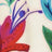 Close-up of a vibrant, abstract floral pattern with a red and purple flower and green leaves, showcasing bold colors and imaginative design.