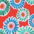 Pattern of stylized, circular blue and green flowers with pink centers creates a lively, vibrant design.