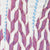 Close-up of a patterned fabric featuring diagonal maroon chevrons and blue zigzag lines on white cotton.