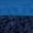 A blurry image features a gradient, with a lighter blue area on top blending into a darker, textured blue below.