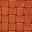 Close-up of a woven pattern crafted from reddish-brown tiles, arranged in an alternating over-under design for a striking textured surface.