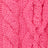 Close-up of pink cable knit fabric showcasing a detailed braided pattern.
