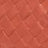 Close-up of a textured surface in reddish-orange, featuring a repeating diamond or basket weave pattern that adds depth and visual interest.