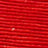Close-up of a textured red surface with parallel horizontal lines and tiny white specks, highlighting intricate details.