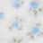 A blurry image with indistinct blue and white shapes, lacking clear details or recognizable objects, creates an abstract visual impression.