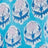 A pattern of stylized blue and white floral motifs with pink details, featuring intricate designs and soft hues.